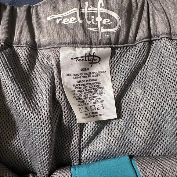 Reel Life men's mesh lined teal shorts size medium, with zip pocket on side - Picture 4 of 4